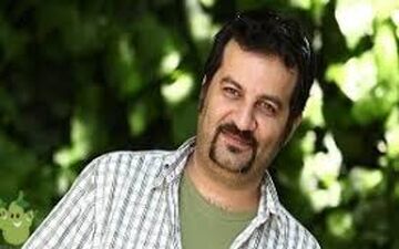 مهراب قاسمخانی به همراه همسر و دخترش در چالوس