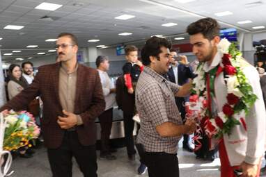 مراسم استقبال از احمد سجادی نفر سوم مسابقات آسیا در فرودگاه كرمانشاه