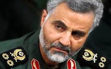 سردار سلیمانی بر سر مزار جلال طالبانی