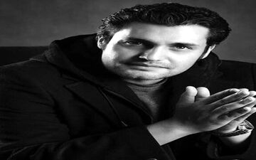 بازیگر مشهور بر مزار پدر در کربلا 