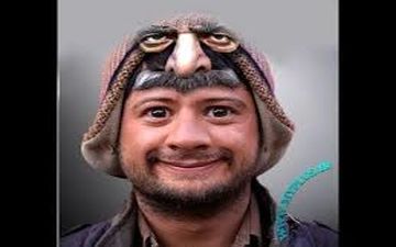 تیپ و ژست عجیب علی صادقی با یک طوطی
