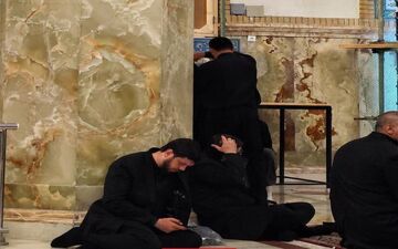 عکسی از محافظ آیت الله رئیسی در مراسم تشییع