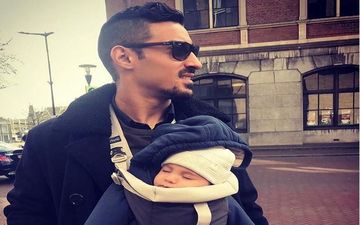 پیاده روی رضا قوچان نژاد به همراه فرزندش (عکس)