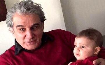 بابابزرگ هنرمند در کنار نوه اش
