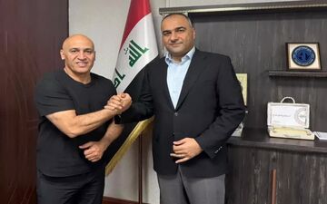 استقبال ویژه از منصوریان در موصل؛ بنر سرمربی الطلبه با لباس کردی در هتل

